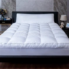 Nadvložek za hotelsko posteljo